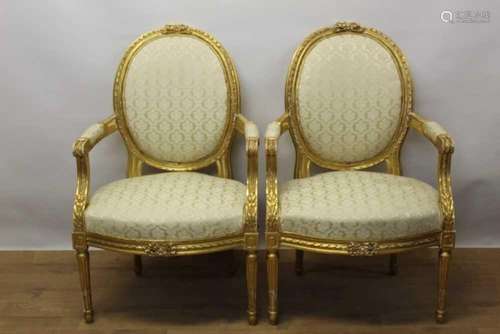 Pair of George III style gilt open armchairs