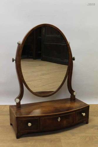 Regency mahogany bowfront swing frame toilet mirror