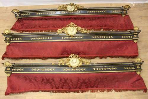 Set of three 19th century ebonised and gilt gesso pelmets