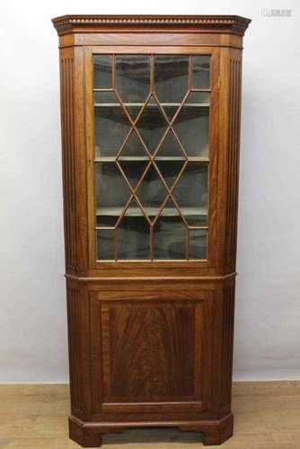 Late 19th century mahogany two height corner cupboard, the a...