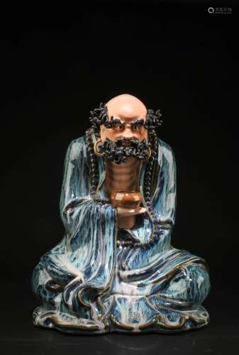 A Shiwan Immortal Figurine