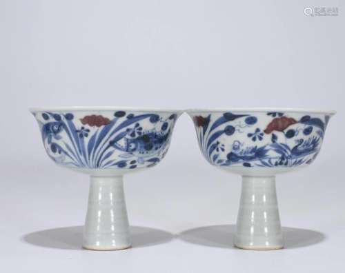 A Pair of Iron Red Blue & White Stem Cups
