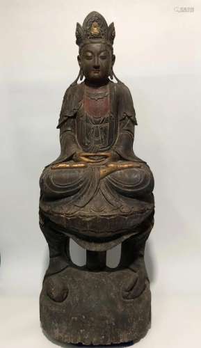A Carved Wooden Guanyin Statue