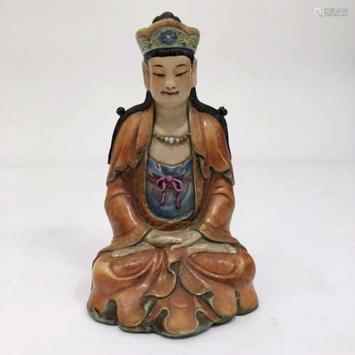 A Porcelain Guanyin Statue