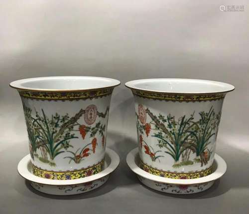 PAIR OF CHINESE FAMILLE ROSE POTS