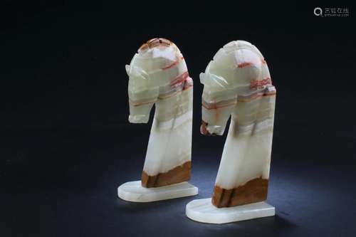 A Pair of Stone Carved Horse Statues