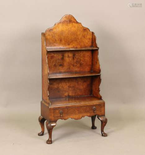An early 20th century Queen Anne style walnut waterfall thre...