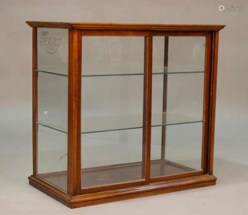 An early 20th century mahogany framed counter-top display ca...