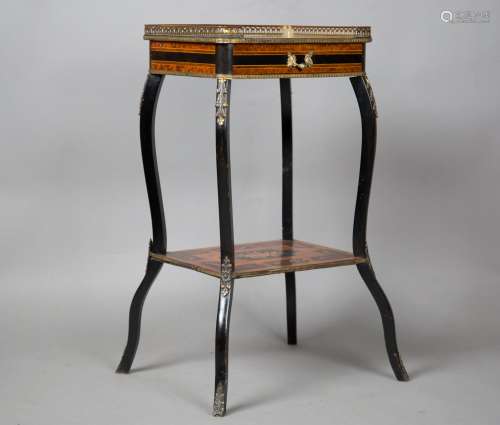 A 19th century French kingwood and ebonized side table with ...