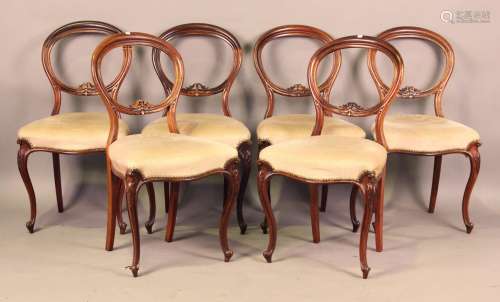 A set of six mid-Victorian rosewood framed balloon back dini...