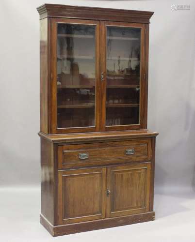A late Victorian walnut secretaire bookcase cabinet, the gla...