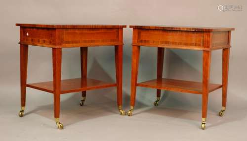 A pair of late 20th century mahogany and walnut lamp tables,...