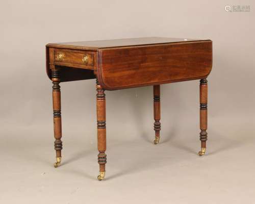 An early Victorian mahogany Pembroke table, on ring turned l...