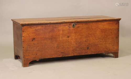 An 18th century oak boarded coffer with hinged lid and inter...