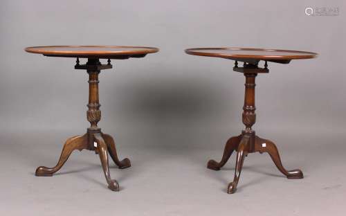 A pair of late 20th century George III style walnut tip-top ...