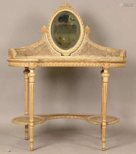 An early 20th century Louis XVI style cream painted kidney s...