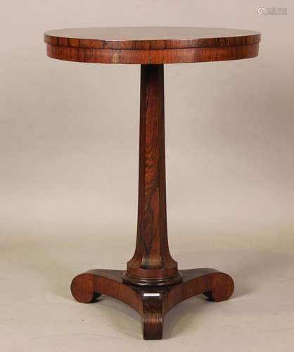 A William IV rosewood wine table, the circular top on a flar...