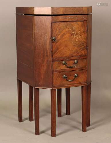 A late George III mahogany gentlemans washstand, the hinged ...