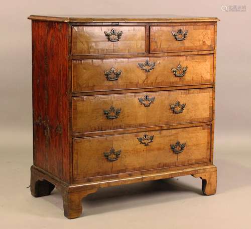 A George I provincial walnut chest of drawers with overall c...