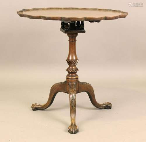 A George III mahogany tip-top wine table, the lobed circular...