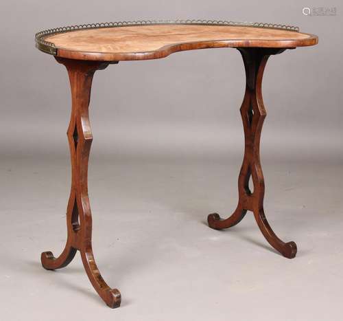 A 19th century mahogany kidney shaped writing table, the bra...