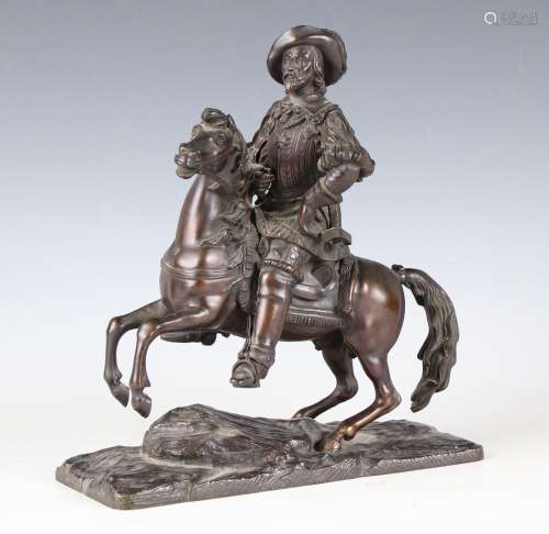 A 19th century French brown patinated cast bronze equestrian...