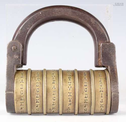 A 19th century brass and steel six barrel combination lock, ...