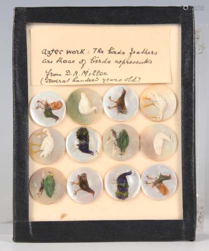 A set of twelve 19th century mother-of-pearl and feather dec...