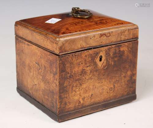 A George III fruitwood tea caddy with hinged lid enclosing a...