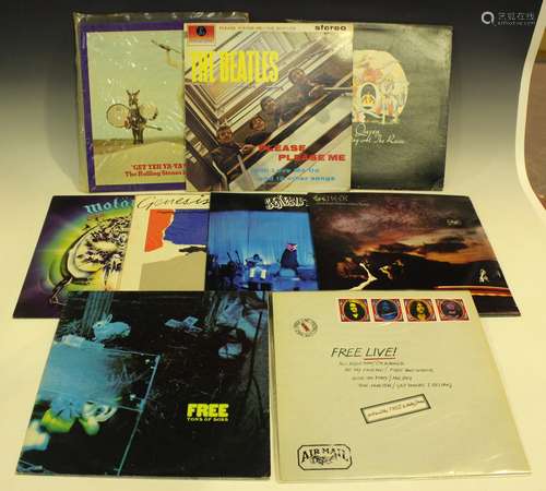 A collection of approximately eighty LP records, including a...