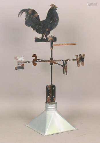 A 20th century sheet metal weather vane in the form of a chi...