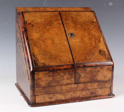 A mid-Victorian burr walnut writing box, enclosed by two slo...