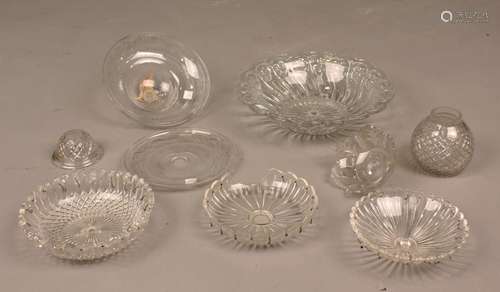 A collection of cut and moulded glass light fittings and taz...