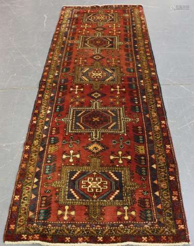 A Heriz runner, North-west Persia, mid-20th century, the ter...