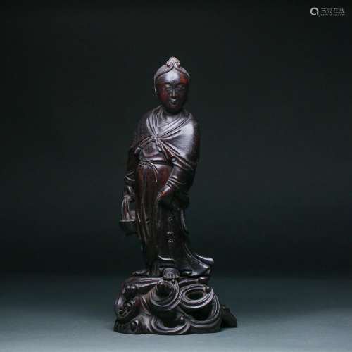 A Carved Rose-wood Standing Immortal