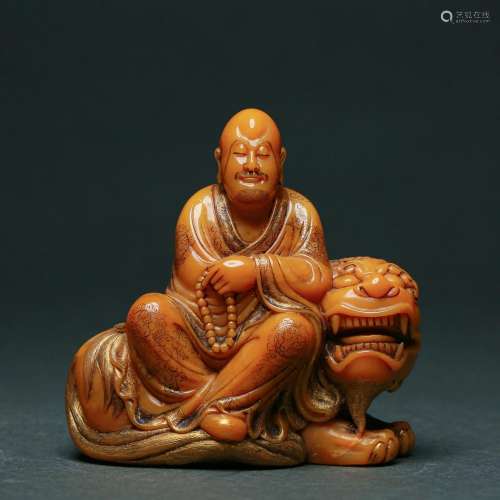 A Carved Tianhuang Seated Arhat