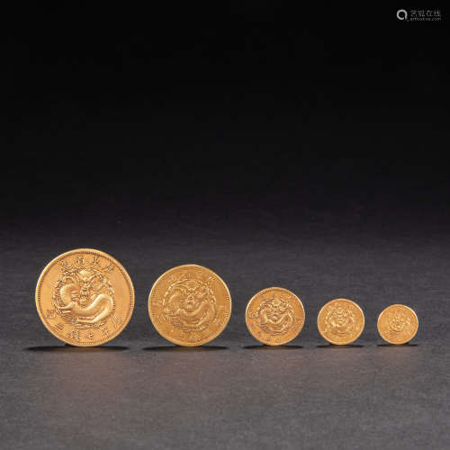 A SET OF CHINESE GOLD COINS