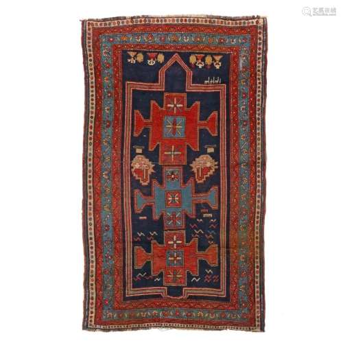 AN ORIENTAL CARPET