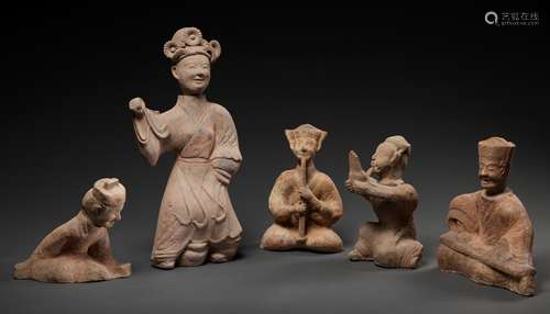 AN EXTREMELY RARE GROUP OF FIVE POTTERY MUSICIANS AND DANCER...