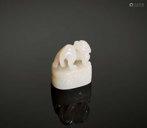 A WHITE AND RUSSET JADE ‘CHILONG’ SEAL, QING DYNASTY