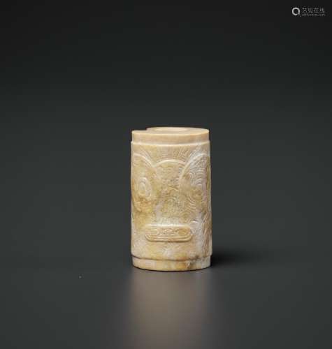 A CARVED CYLINDRICAL JADE BEAD, LIANGZHU CULTURE