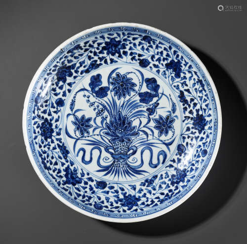 A MING-STYLE BLUE AND WHITE 'LOTUS BOUQUET' DISH, 18TH CENTU...