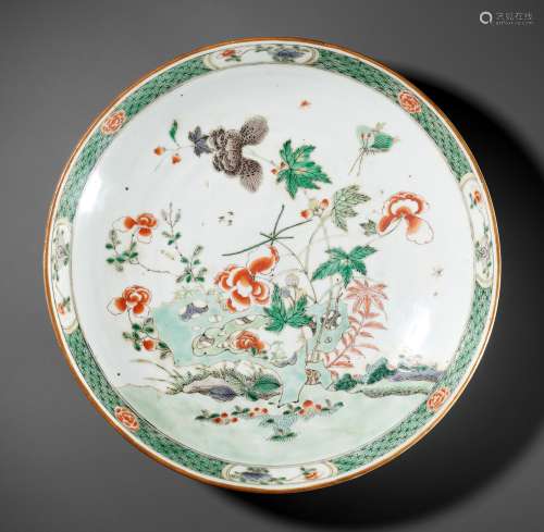 A FAMILLE VERTE ‘FLOWERS AND BUTTERFLY’ DISH, KANGXI PERIOD