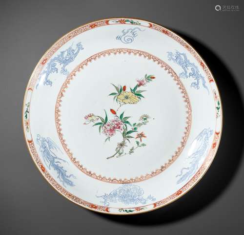 AN IRON RED AND GILT ‘SEVEN BLOSSOMS’ DISH, KANGXI/YONGZHENG...