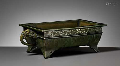 AN ARCHAISITC GREEN GLAZED JARDINIERE, 19TH CENTURY