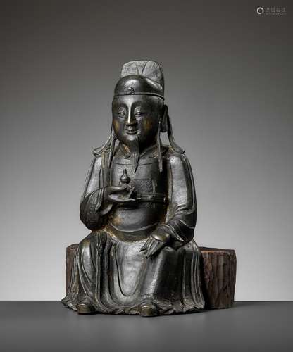 A BRONZE FIGURE OF A DAOIST DIGNITARY, MING DYNASTY