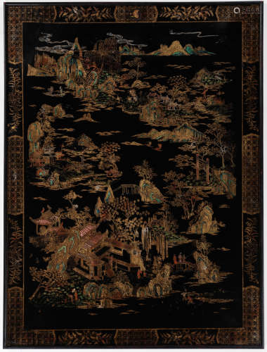 † A MONUMENTAL GILT LACQUER ‘MOUNTAIN’ PANEL, CANTON, QING D...
