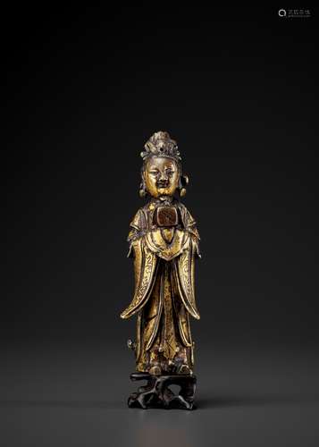 A GILT-BRONZE FIGURE OF A LADY, MING DYNASTY