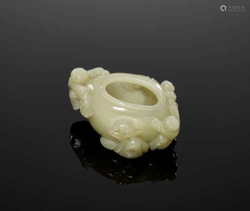 A SMALL PALE-YELLOW JADE ‘BOYS’ WATER POT, LATE QING TO REPU...