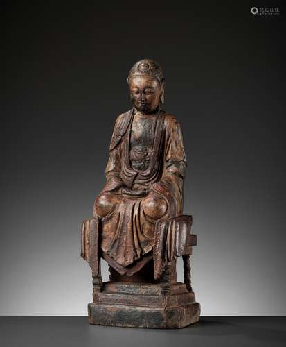 A CARVED HARDWOOD FIGURE OF BUDDHA, MING DYNASTY